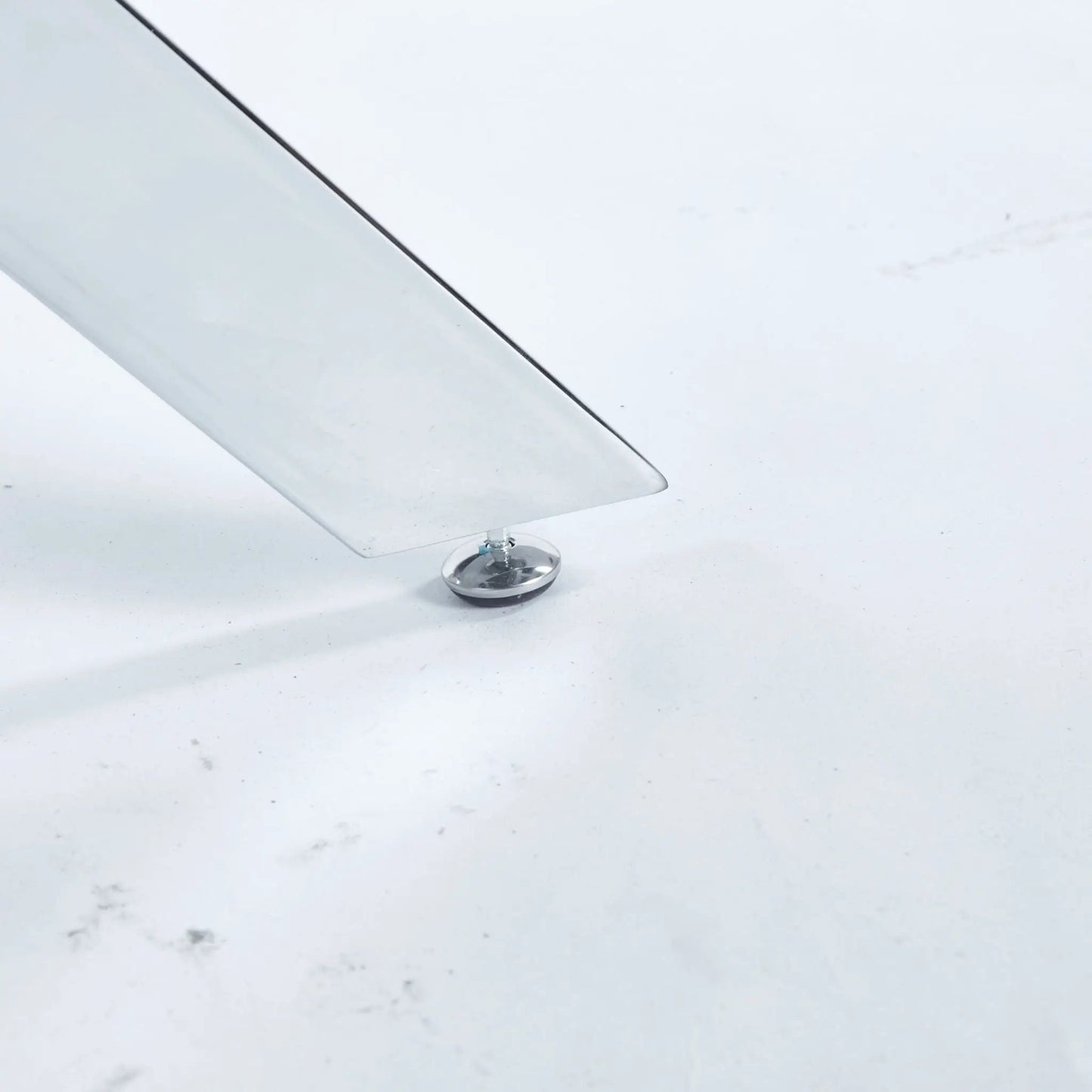 Dining table with tempered glass top and chrome pedestal base, modern space-saving design on Tampa Home & Garden Store