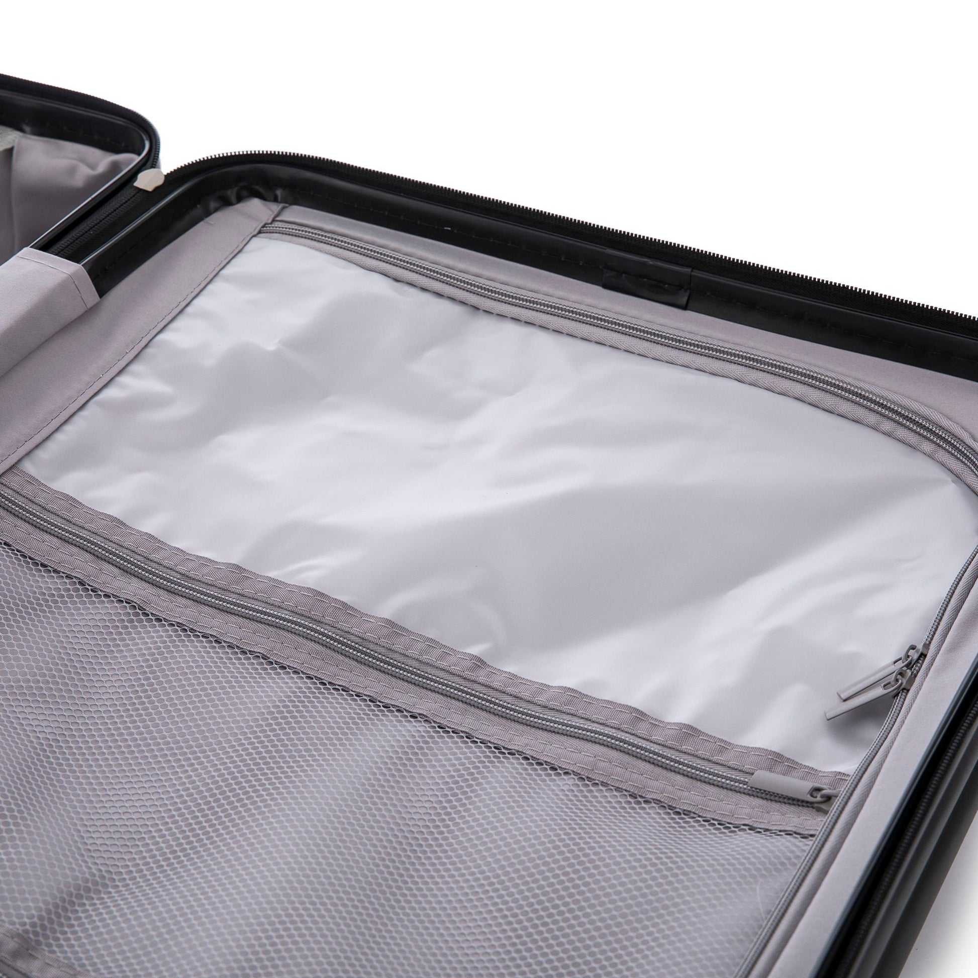 HouseOfZazla spinner luggage interior with gray lining, zippered pocket and mesh organizer on Tampa Home & Garden Store