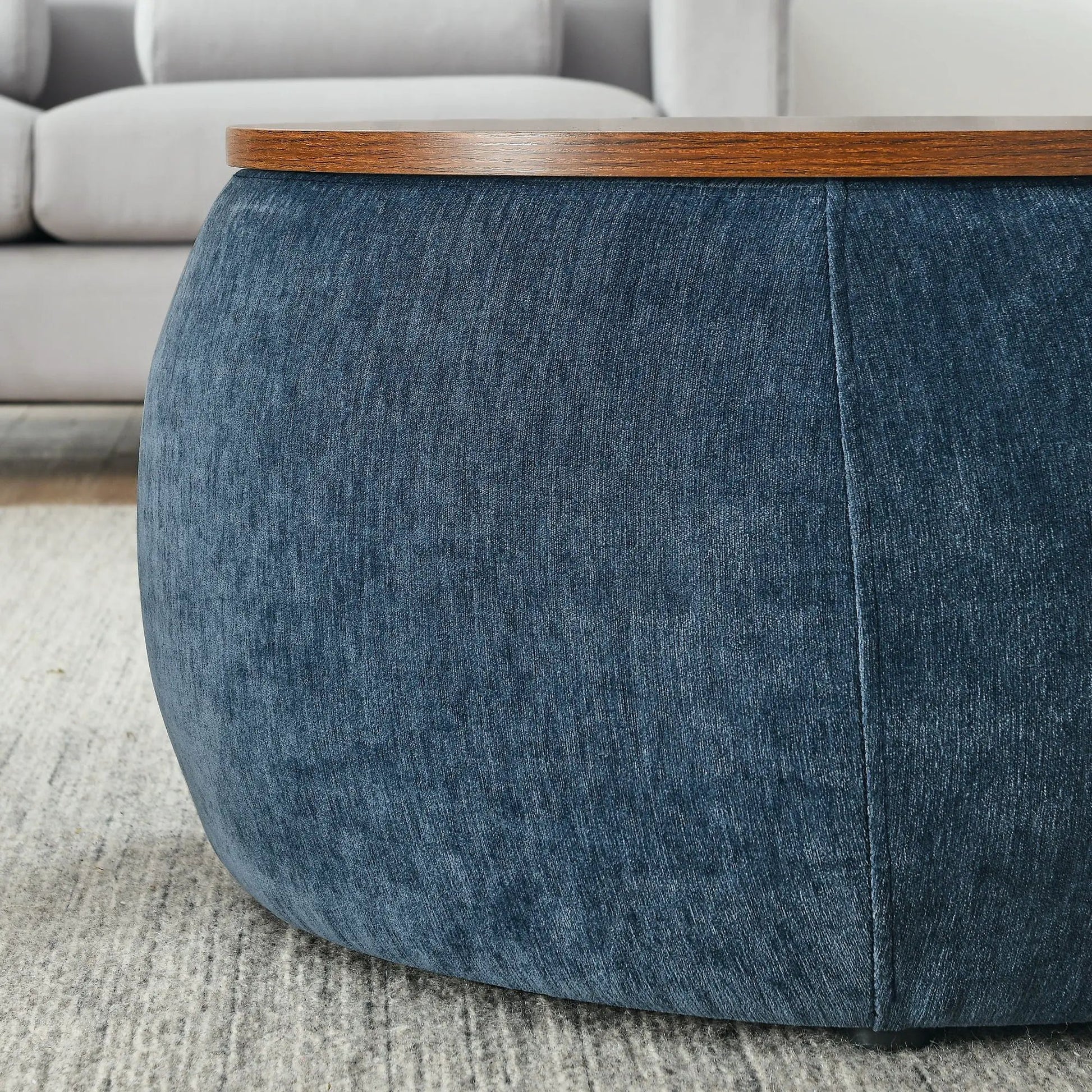 Round storage ottoman in blue denim with wooden top edge by Unique Piece Furniture on Tampa Home & Garden Store