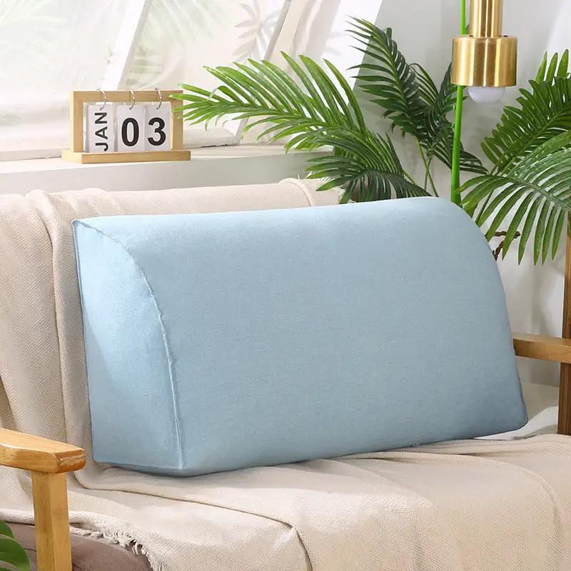 Removable washable blue sofa cushion on beige living room sofa on Tampa Home & Garden Store