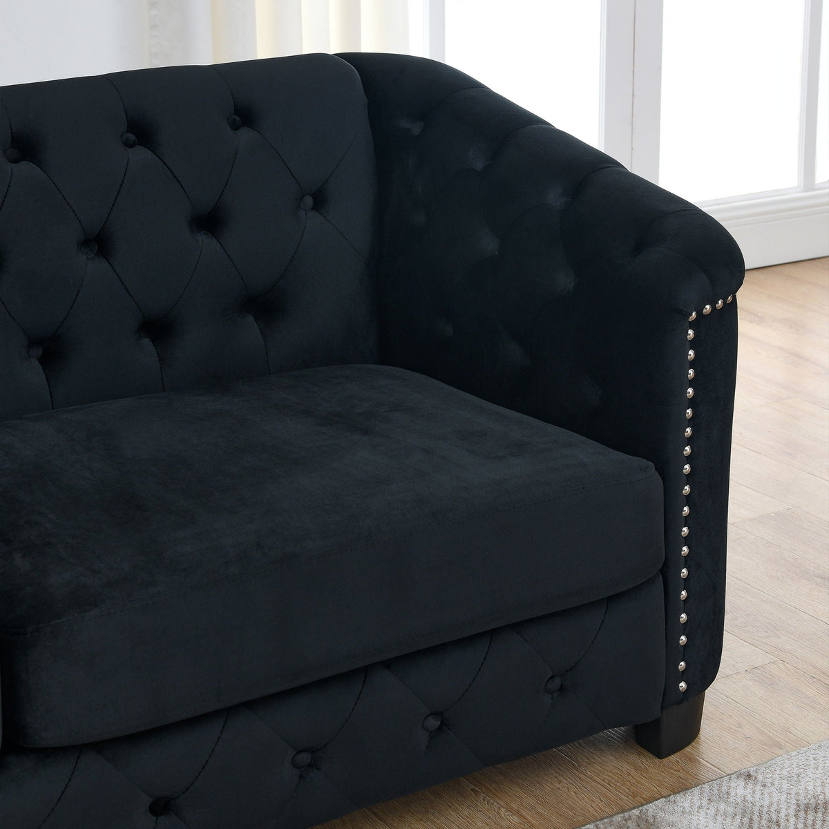 Modern Chesterfield Sofa black velvet with tufted back curved arm and nailhead trim on Tampa Home & Garden Store