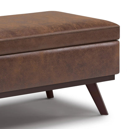 Owen lift-top storage ottoman in brown leather with mid-century legs by Unique Piece Furniture on Tampa Home & Garden Store