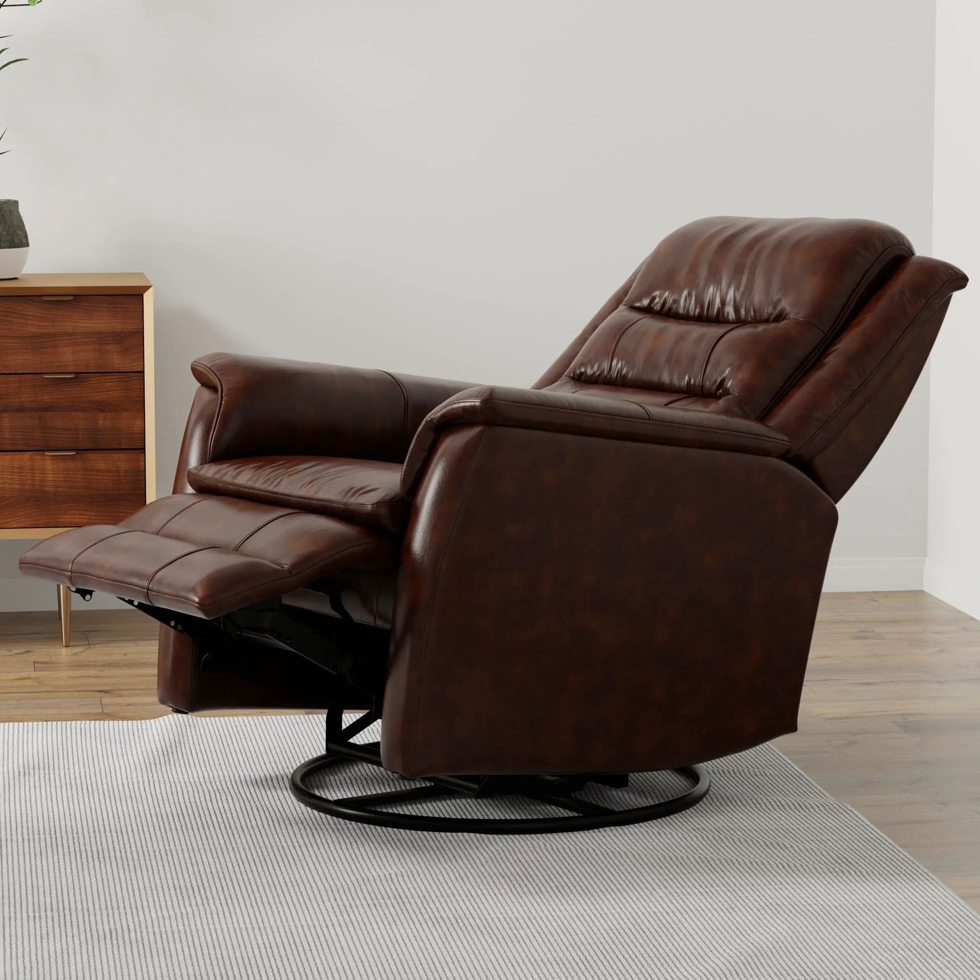Swivel recliner with manual footrest in brown leather beside a table Unique Piece Furniture on Tampa Home & Garden Store