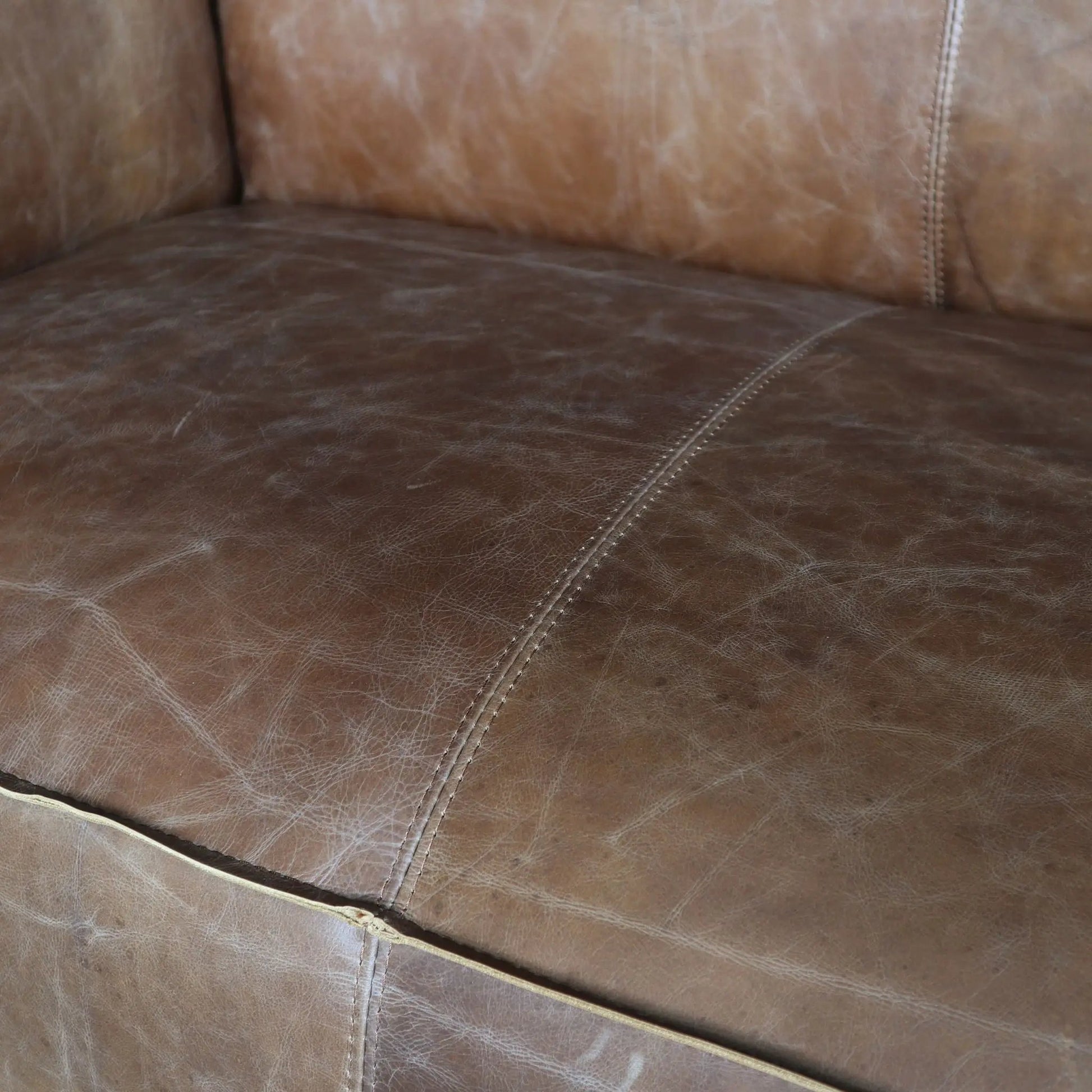 Brancaster grain leather sofa brown with visible stitching and seam panels on Tampa Home & Garden Store