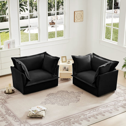 Set of 2 black slipcovered armchairs by HouseOfZazla in a bright white living room on Tampa Home & Garden Store
