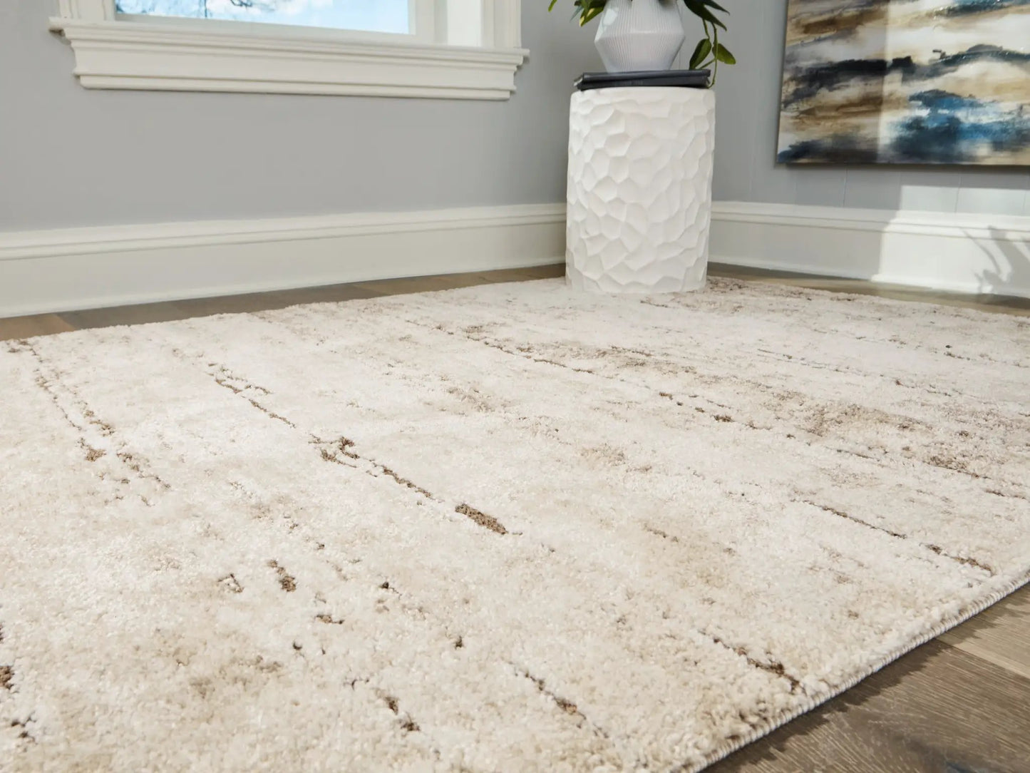Kasney Rug beige shag area rug with brown linear accents on Tampa Home & Garden Store