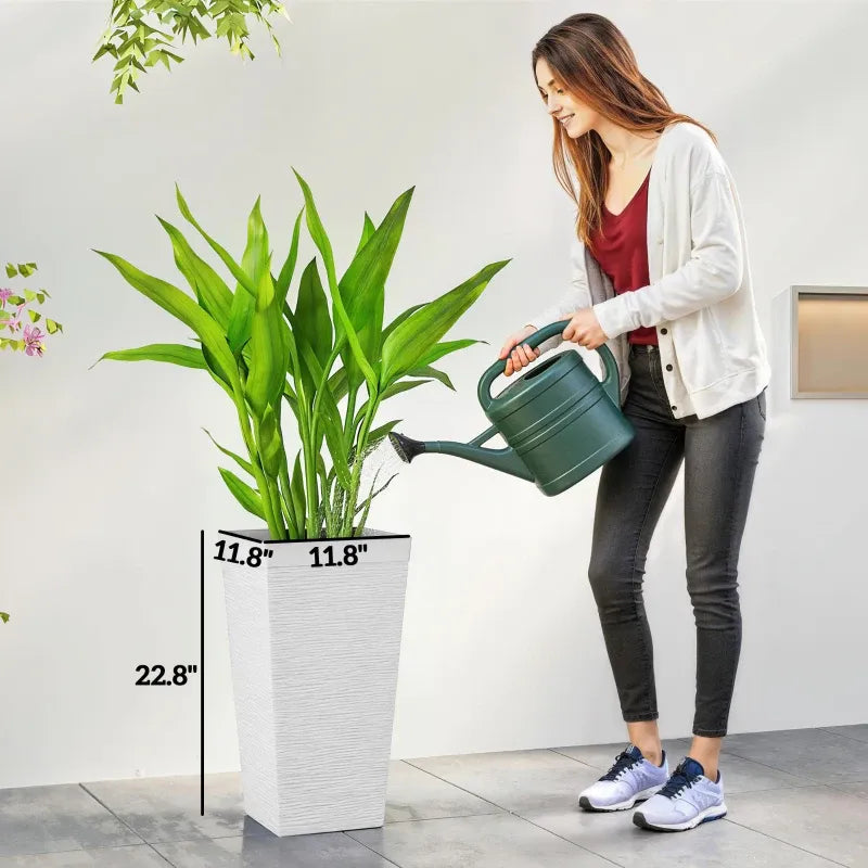 Stackable tapered planters by HouseOfZazla set of 3 white planters with tall green plants on Tampa Home & Garden Store