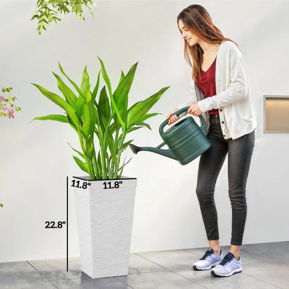 Stackable tapered planters by HouseOfZazla set of 3 white planters with tall green plants on Tampa Home & Garden Store