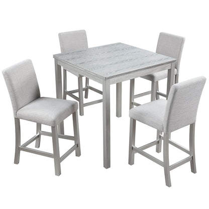 Counter height 5-piece dining set with 4 upholstered gray chairs and rhinestone trim table on Tampa Home & Garden Store