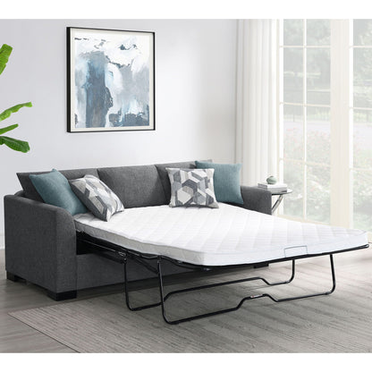 Pacheco Sleeper Sectional Chaise Sofa in charcoal gray fabric with pull-out bed and teal pillows on Tampa Home & Garden Store
