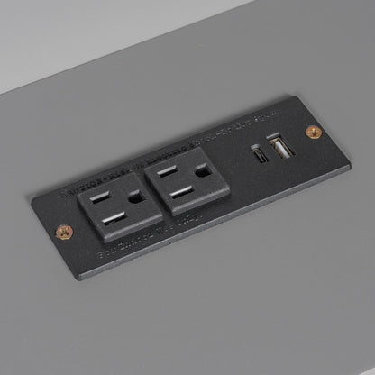 Platform bed built-in charging panel with USB ports on a black insert set into a gray bed surface on Tampa Home & Garden Store