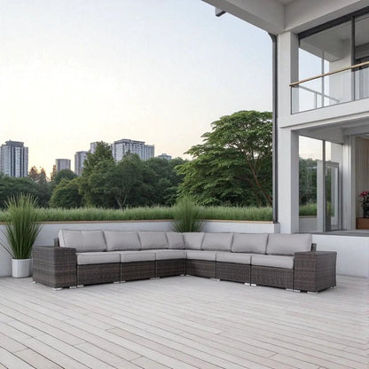 Rattan sectional sofa set with gray cushions on a modern outdoor patio by Unique Piece Furniture on Tampa Home & Garden Store
