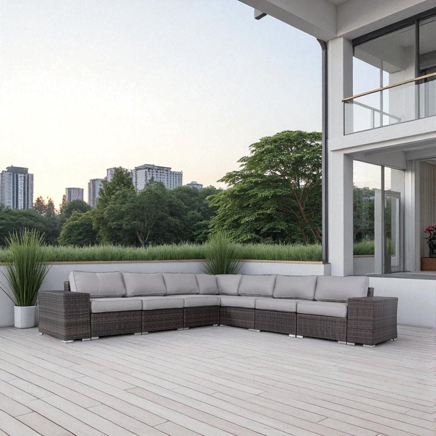 Rattan sectional sofa with cream cushions in dark brown wicker on a patio by HouseOfZazla on Tampa Home & Garden Store