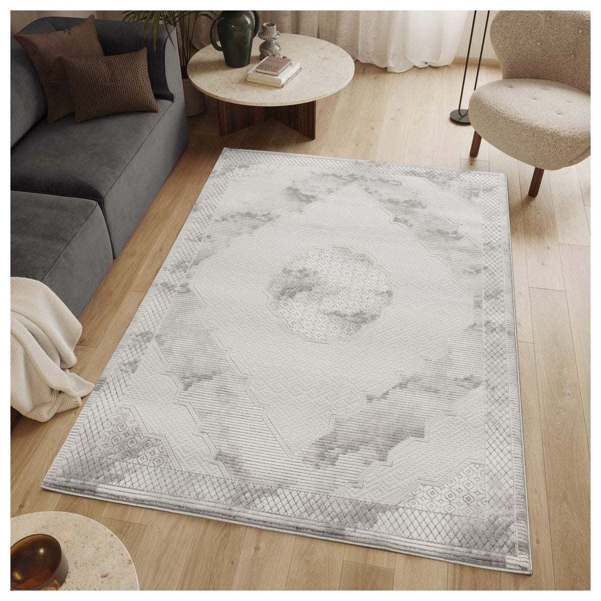 Geometric 3D Medallion Rug gray ivory by HouseOfZazla, area rug on light wood floor on Tampa Home & Garden Store