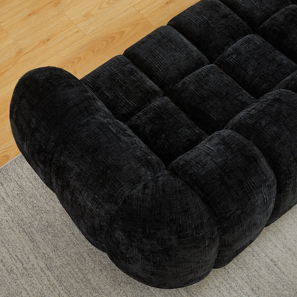 Rounded Cloud Sofa and Piano Key Backrest Design