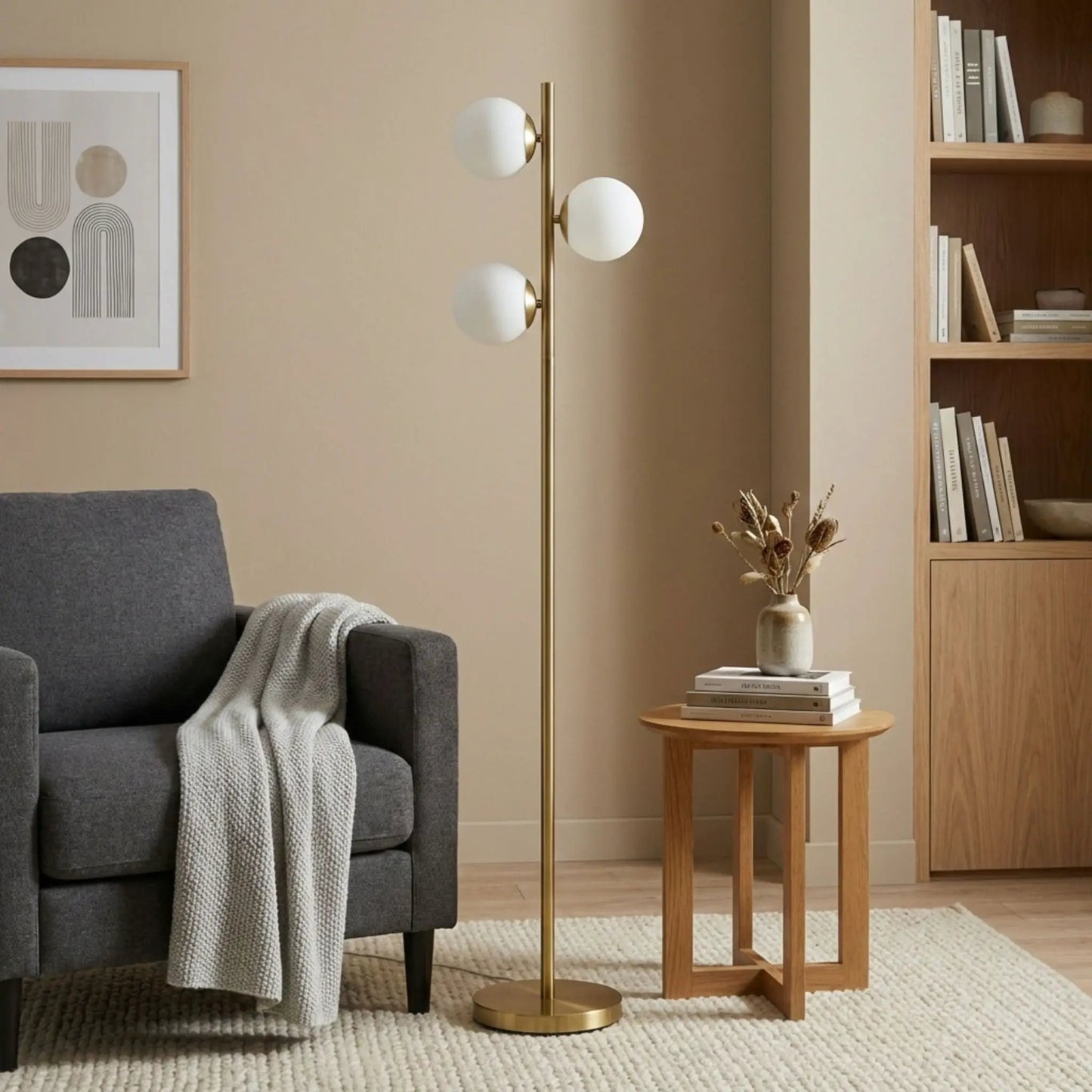 Floor lamp with three frosted opal globe shades on a brass gold stem and circular base on Tampa Home & Garden Store
