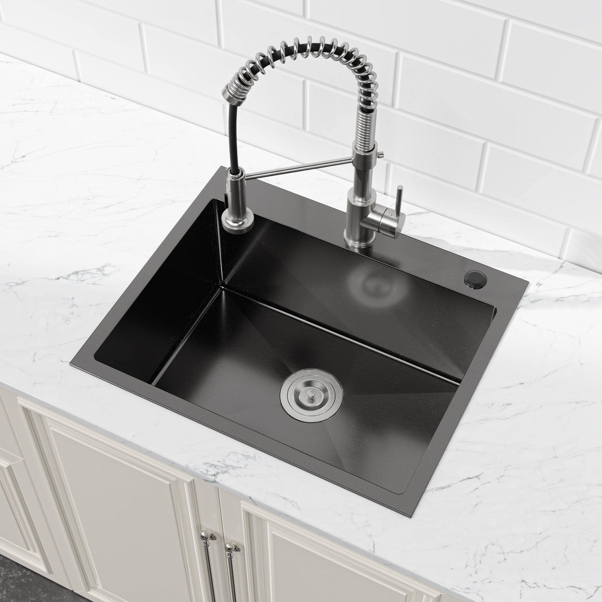 Stainless steel kitchen faucet with coiled spring pull-down hose over a black undermount sink on Tampa Home & Garden Store