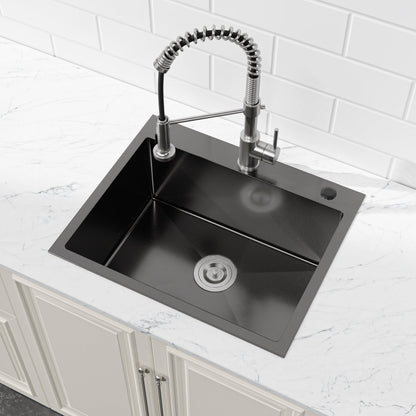 Stainless steel kitchen faucet with coiled spring pull-down hose over a black undermount sink on Tampa Home & Garden Store