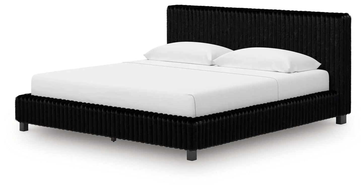 Zuraleus upholstered bed by Unique Piece Furniture with black tufted headboard on Tampa Home & Garden Store