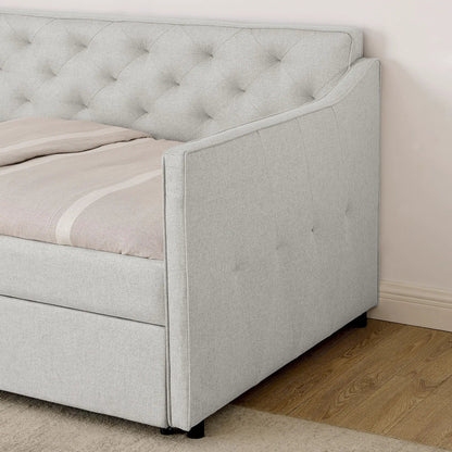 Daybed with pop up trundle and USB charging armrest in light gray tufted fabric on Tampa Home & Garden Store