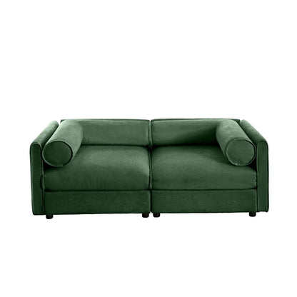 Stylish green velvet stationary sofa with cylindrical bolster pillows at sides on Tampa Home & Garden Store