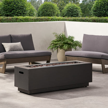 Modern Dark Grey Outdoor Iron Propane Fire Pit by HouseOfZazla with lava rocks and lounge chairs on Tampa Home & Garden Store