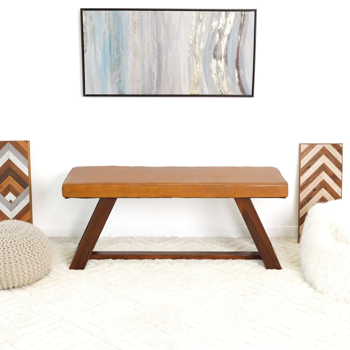 Light brown upholstered bench with hand stitching, leather-look cover, solid wood legs on Tampa Home & Garden Store