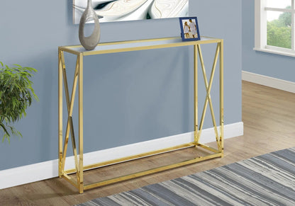 Accent console table in gold metal with glass top, geometric X-frame design on Tampa Home & Garden Store
