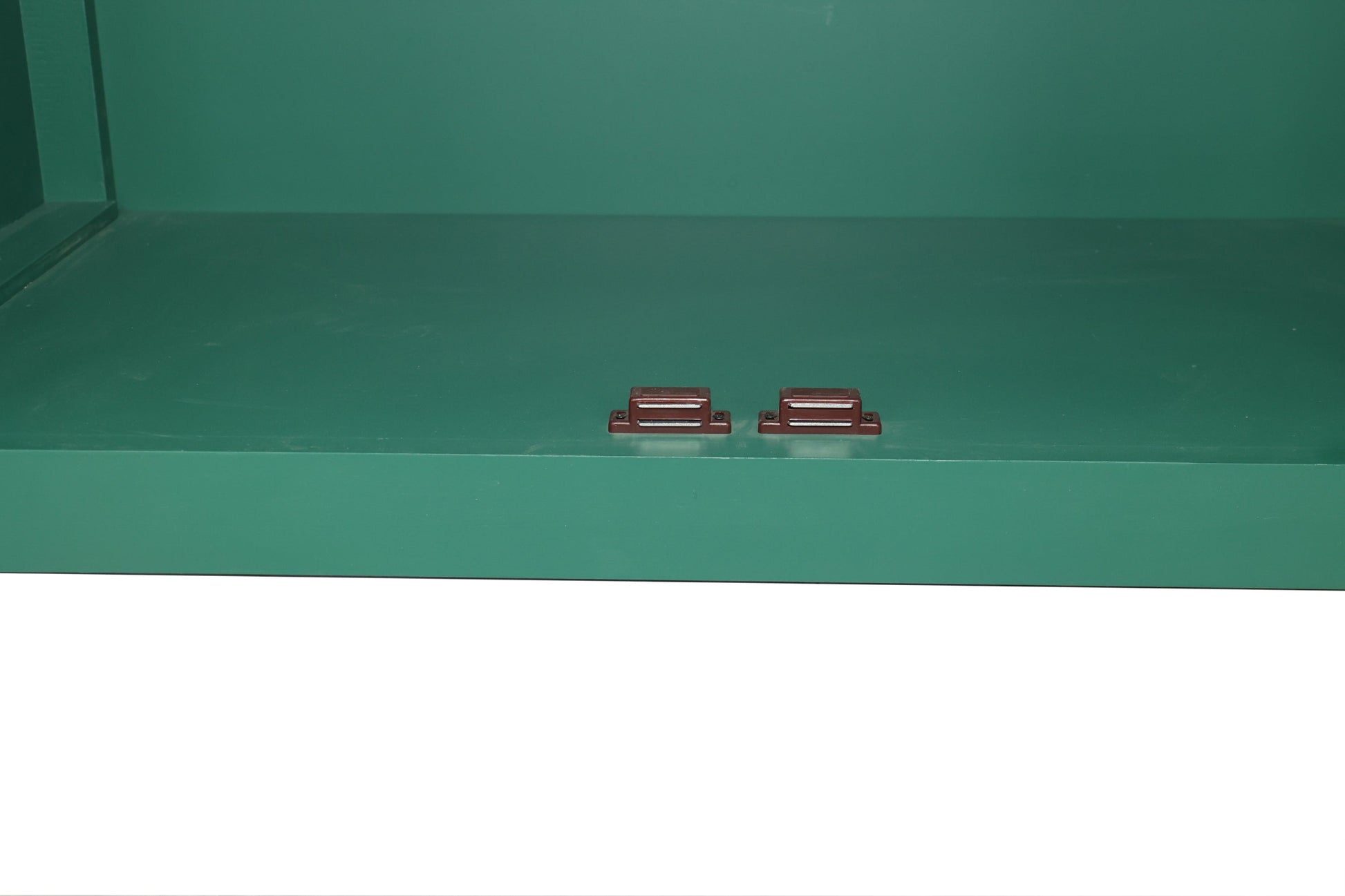 59in green accent cabinet interior with 4 doors; two brown metal brackets on bottom panel on Tampa Home & Garden Store