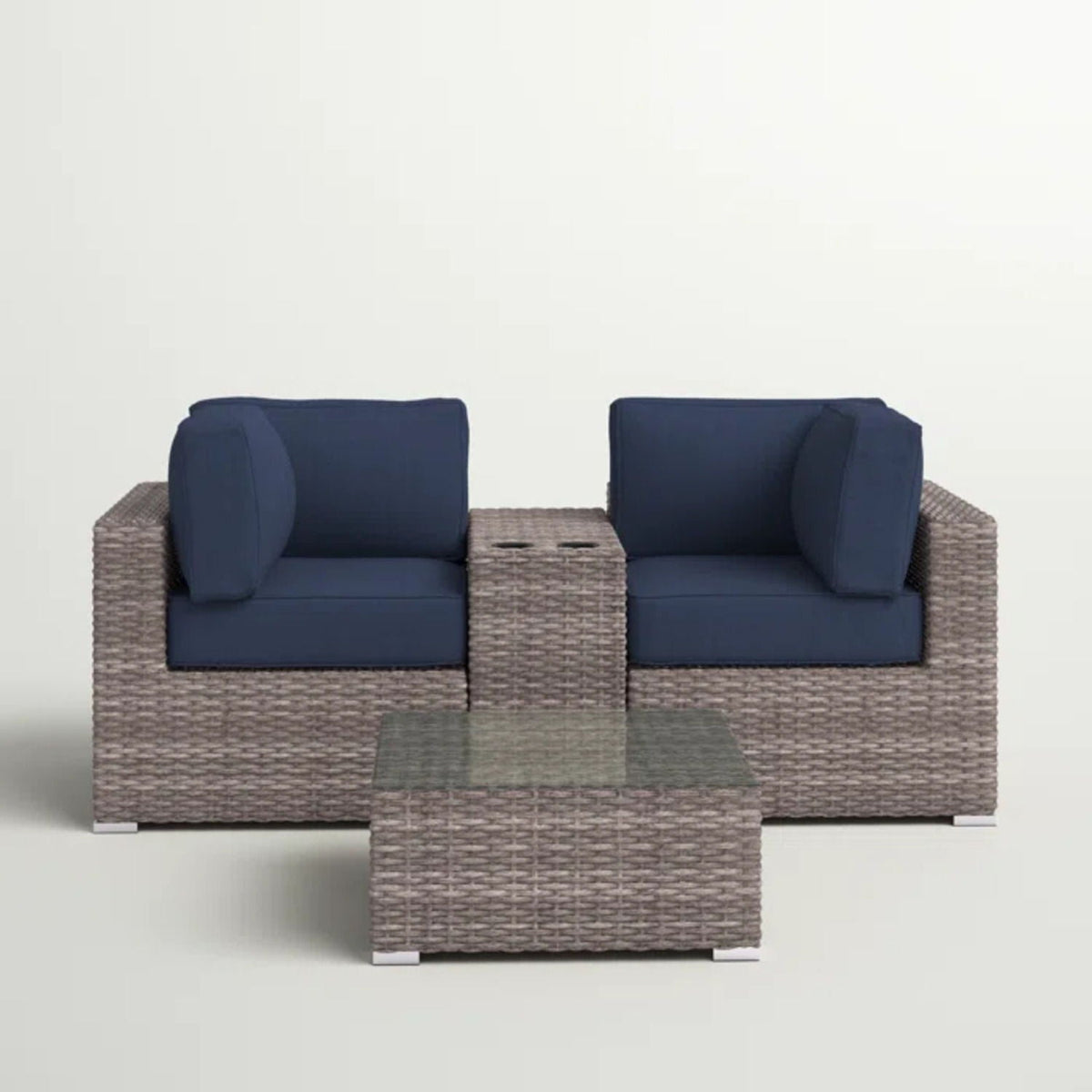 3-piece wicker outdoor seating set with navy cushions and glass-topped coffee table on Tampa Home & Garden Store