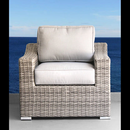 Patio arm chair with beige cushions, woven wicker outdoor seating by HouseOfZazla on Tampa Home & Garden Store