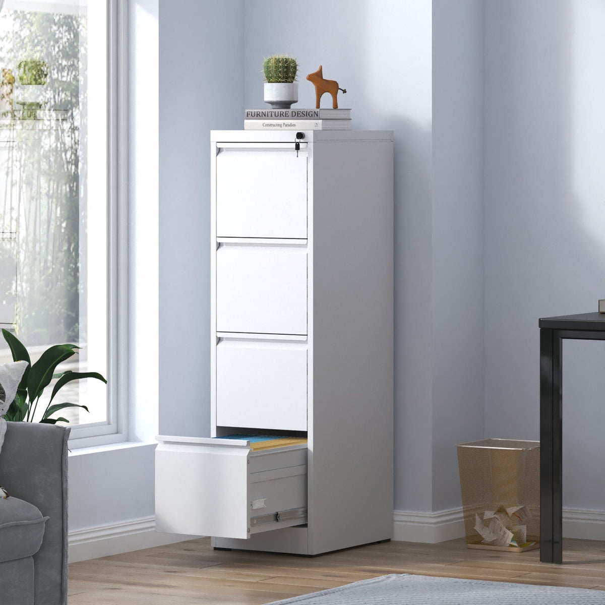 White steel vertical filing cabinet with lock in office topped with cactus and books on Tampa Home & Garden Store