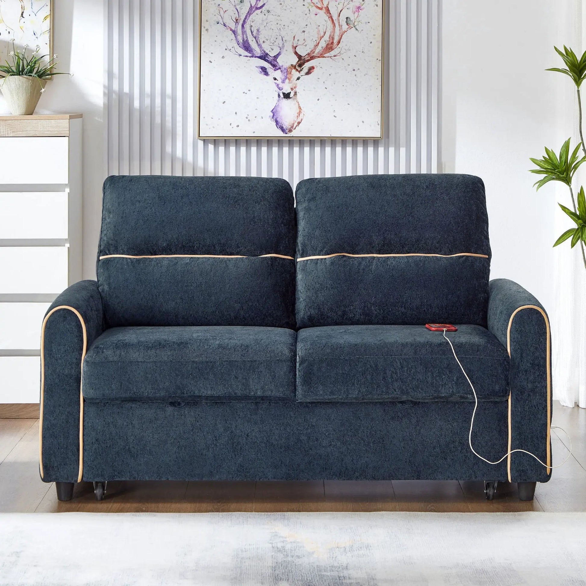 Pull-out sleeper loveseat in dark blue fabric with tan piping, two-seat sofa on Tampa Home & Garden Store