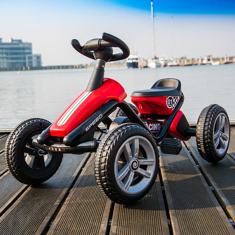 Kids' pedal go-kart red with white racing stripe, 4-wheel outdoor ride-on toy on Tampa Home & Garden Store