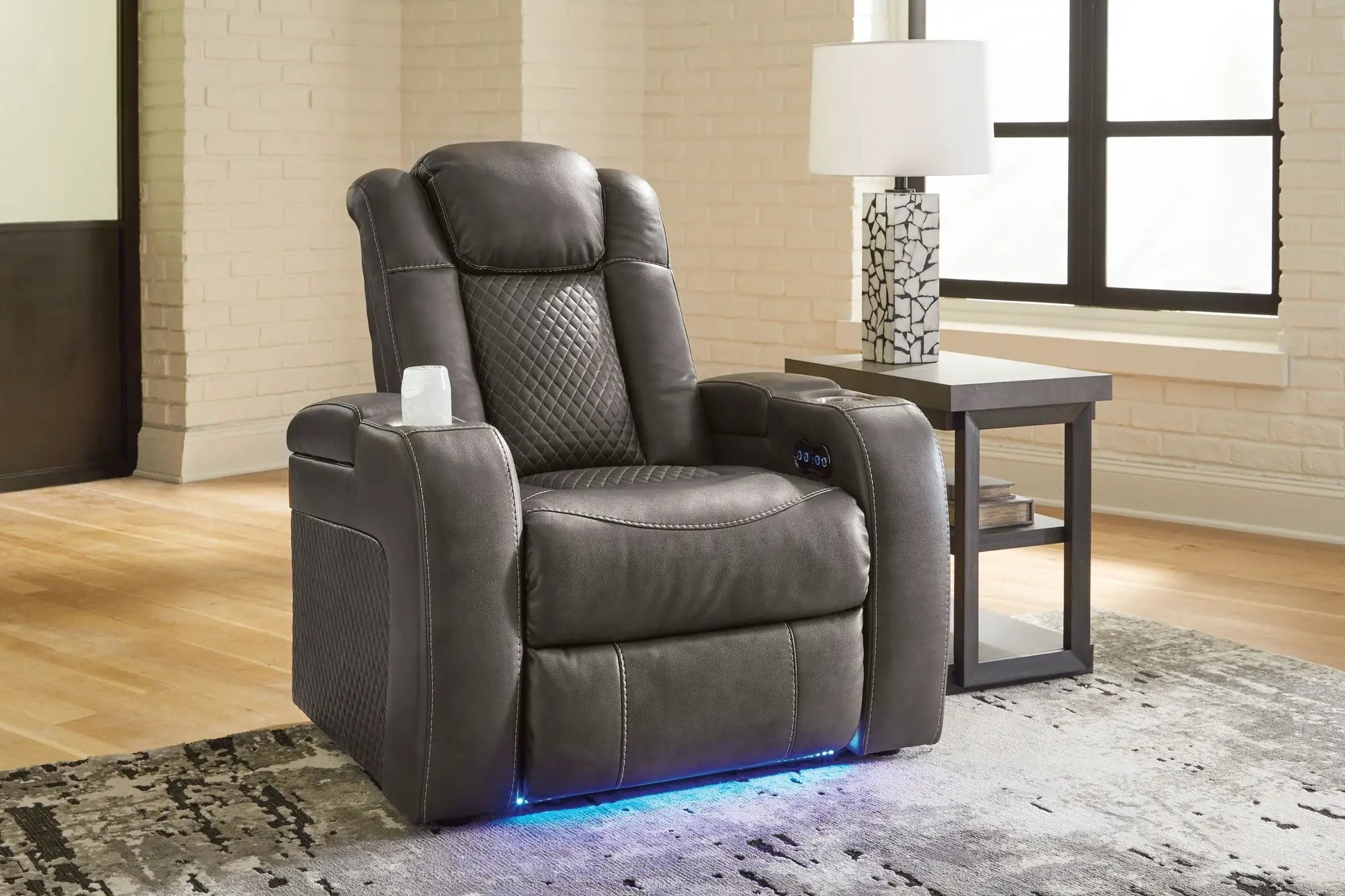 Fyne-dyme Power Recliner with Adjustable Headrest in dark gray leather by Unique Piece Furniture on Tampa Home & Garden Store