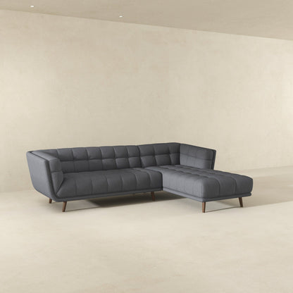 L-shaped tufted sectional sofa by HouseOfZazla in dark gray fabric with wooden legs on Tampa Home & Garden Store