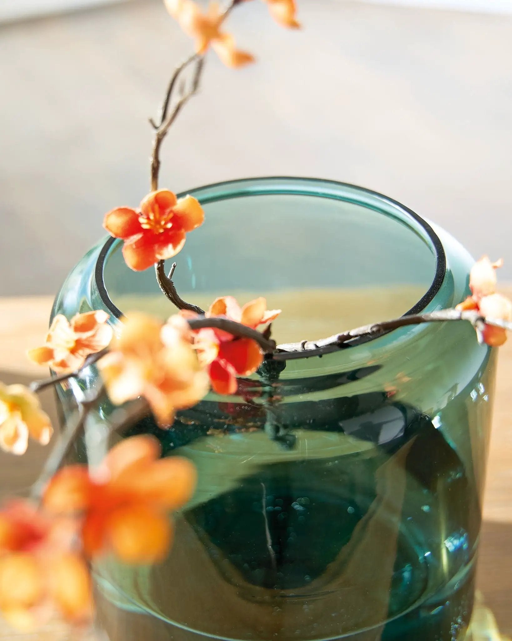 Inisland vase by Unique Piece Furniture, green glass with orange blossoms on Tampa Home & Garden Store