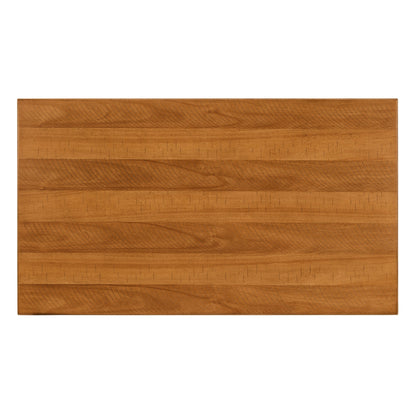 Rectangular wooden coffee table in warm honey oak with pronounced grain texture on Tampa Home & Garden Store