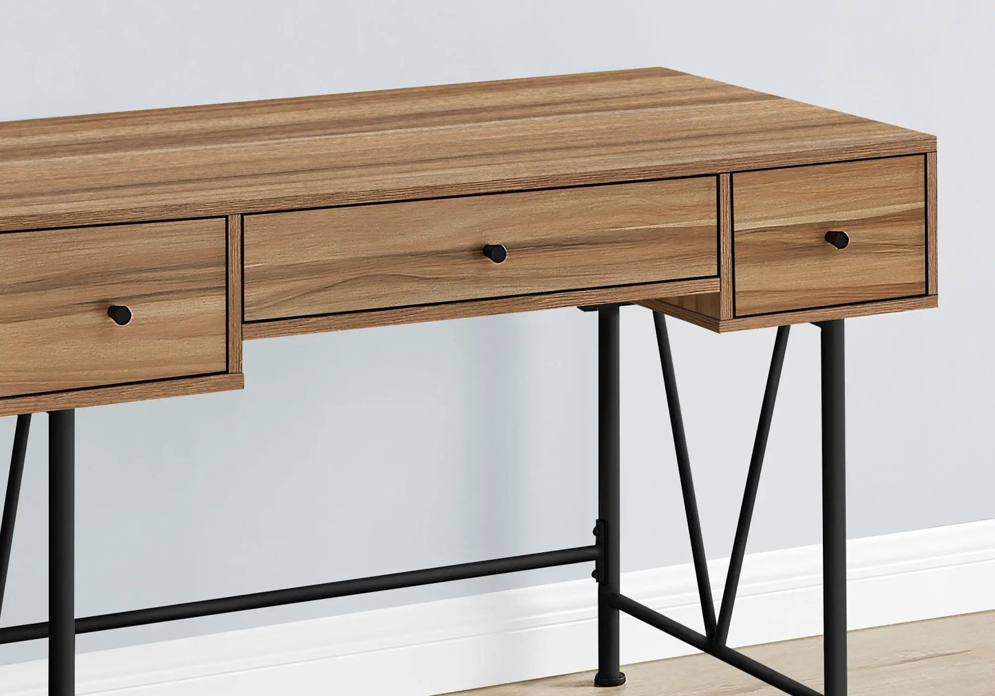 Wooden computer desk with oak finish, three drawers, and black metal legs on Tampa Home & Garden Store