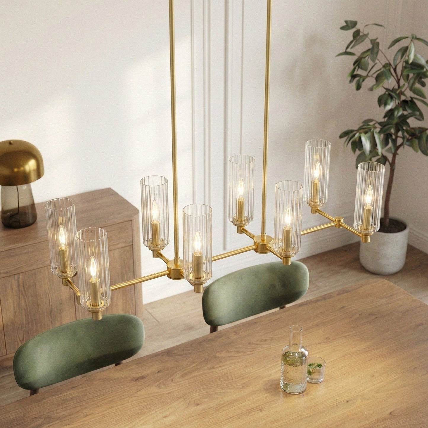Willow 8-light island pendant with satin antique brass finish and clear ribbed glass shades on Tampa Home & Garden Store