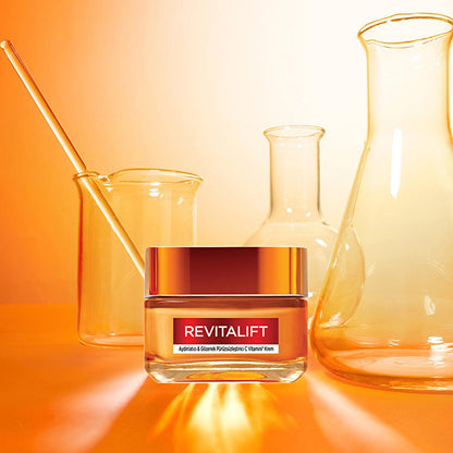 Revitalift face cream jar with orange cap and label, vitamin C anti-aging moisturizer on Tampa Home & Garden Store