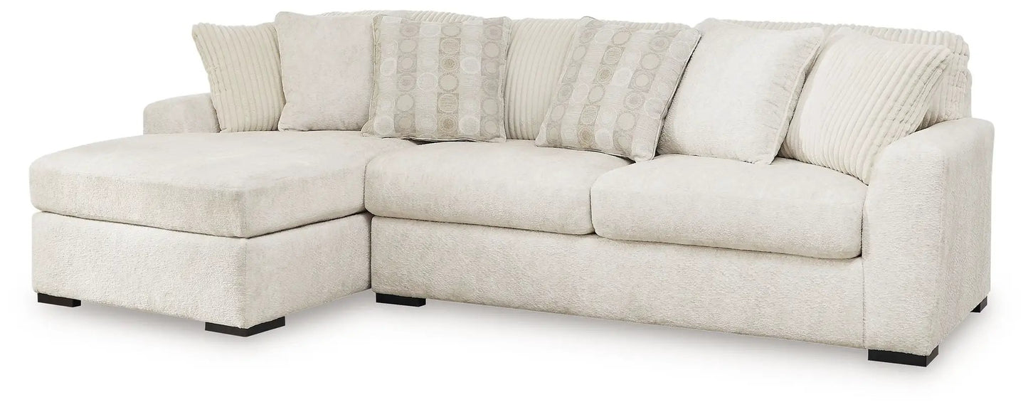 Chessington beige fabric stationary sectional sofa by Unique Piece Furniture with chaise on Tampa Home & Garden Store
