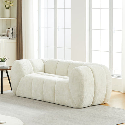 Rounded Cloud Sofa and Piano Key Backrest Design