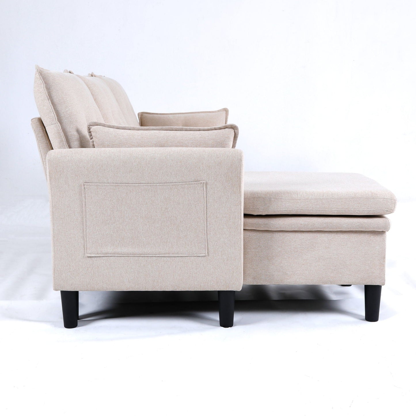 Beige L-shaped reversible chaise sectional sofa with storage and matching ottoman on Tampa Home & Garden Store
