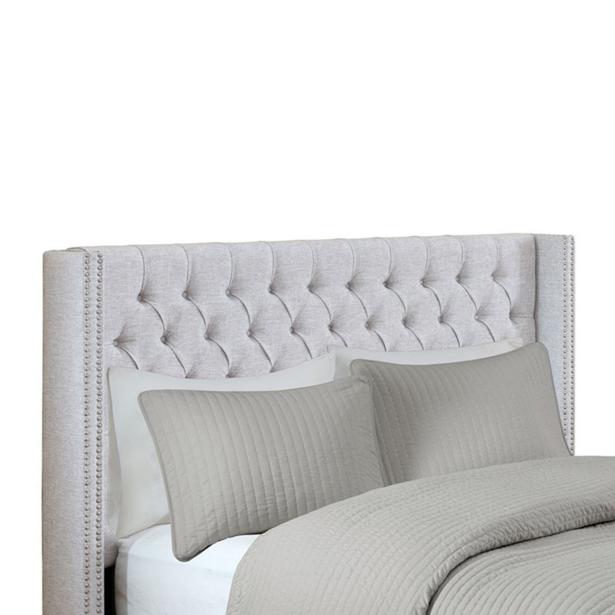 Queen upholstered headboard with tufted buttons and nailhead trim in gray fabric on Tampa Home & Garden Store