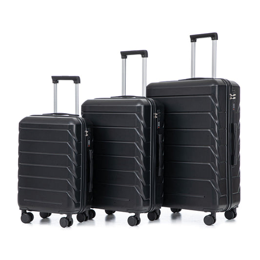 Three-piece black hard-shell spinner luggage set with 20”, 24”, and 28” sizes, combination locks and retractable handles on Tampa Home & Garden Store