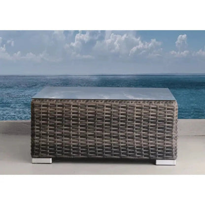 Wicker outdoor coffee table with metal top from 4 piece seating set on Tampa Home & Garden Store