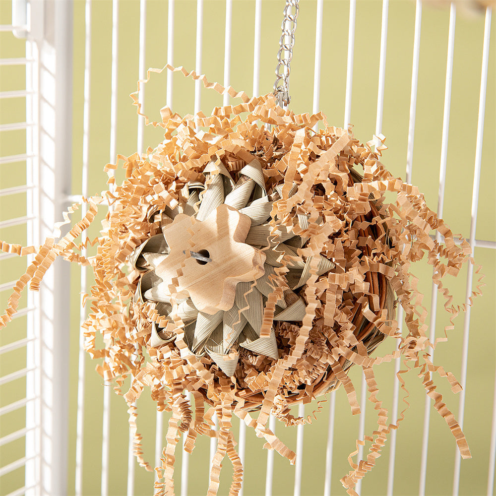 Parrot Bird Toy Gnawing Molar natural wood and paper sphere with shredded curls, hanging in cage on Tampa Home & Garden Store