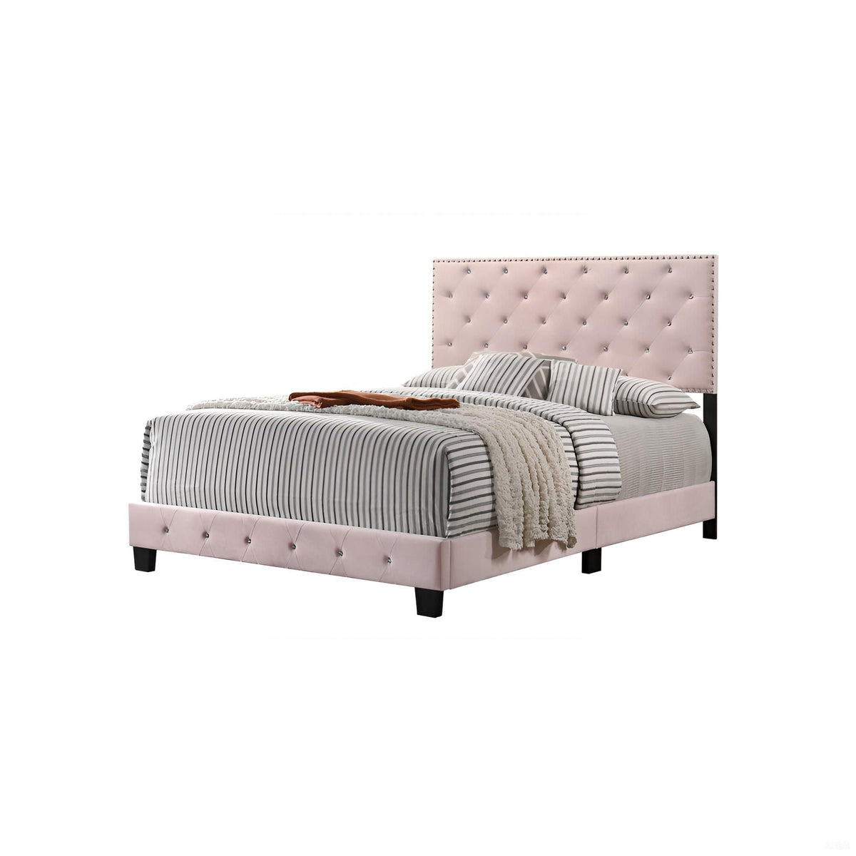 Luxurious upholstered bed by HouseOfZazla with blush tufted headboard and striped bedding on Tampa Home & Garden Store