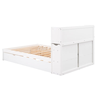 White storage platform bed with pull-out shelves, trundle, and drawers on frame with slats on Tampa Home & Garden Store